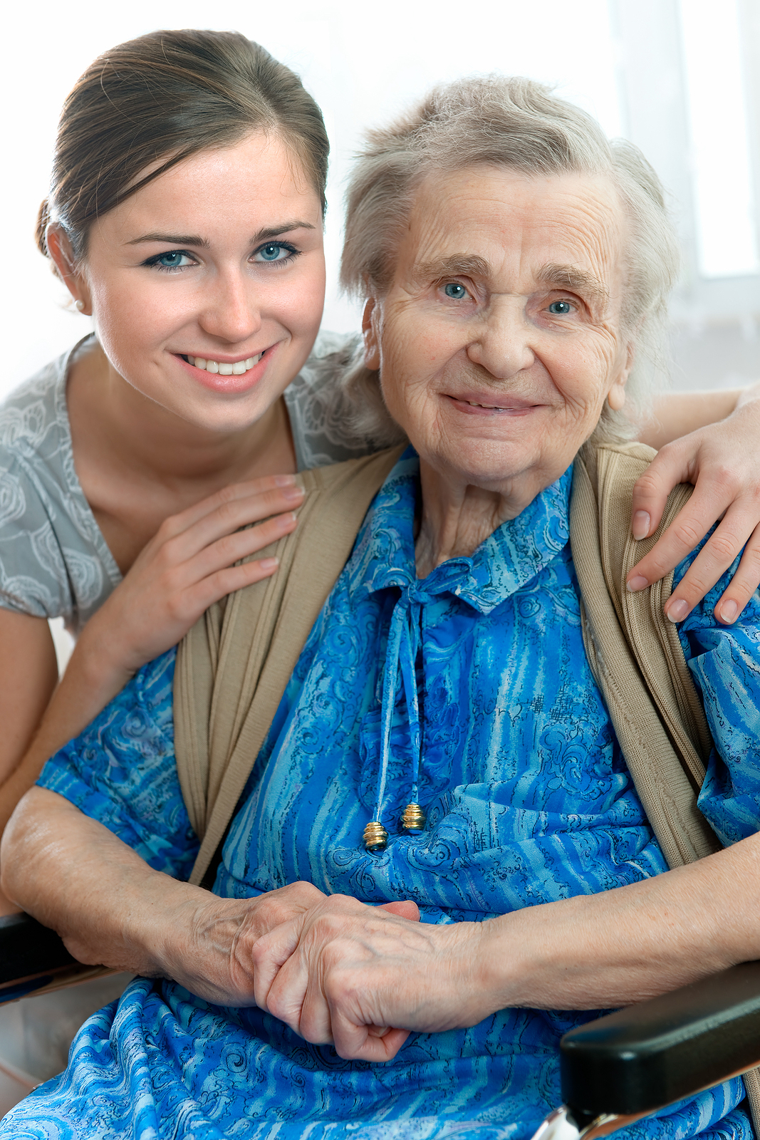 A Place At Home Caregiver with Happy Elderly Woman